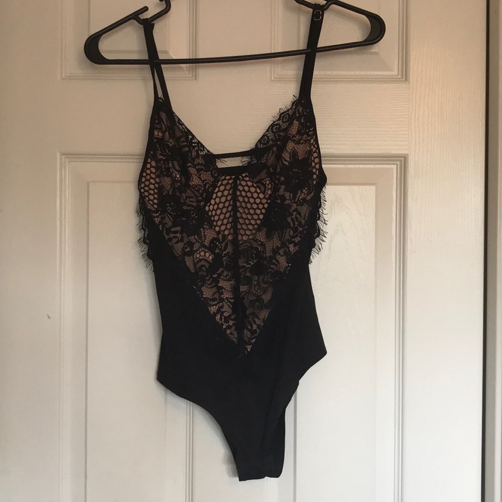 Lace bodysuit. Never worn.